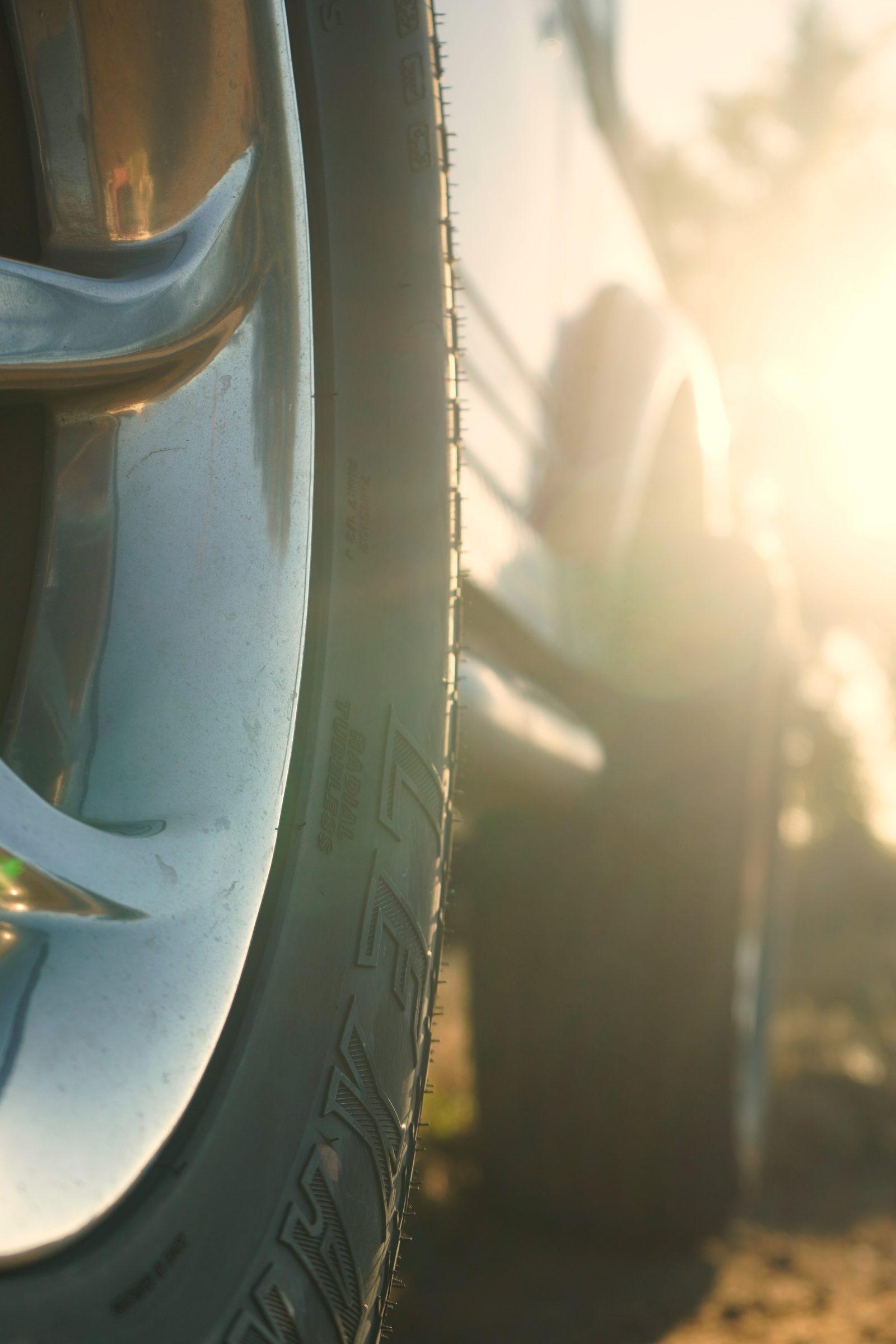 Close-up detail of a tire and wheel on a Suzuki Samurai