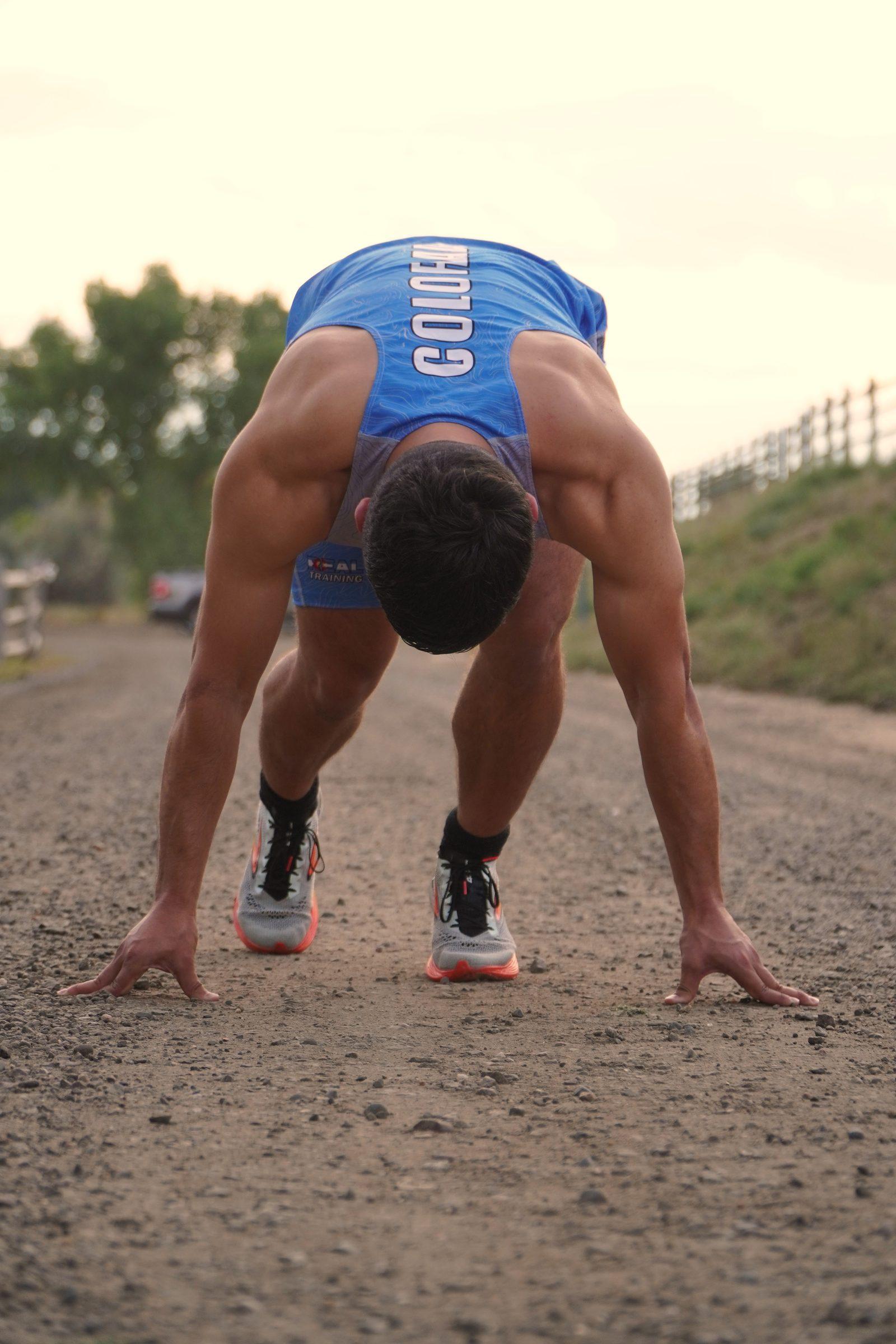 Senior athletic portrait, running in Colorado training gear
